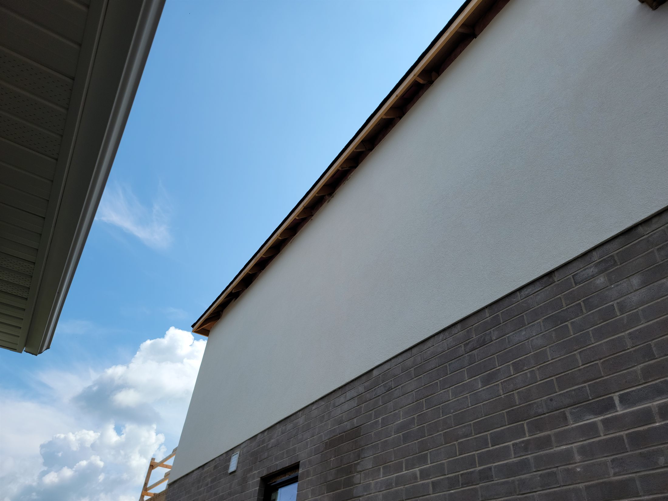 Faux wood finish detail on a Niagara Region exterior