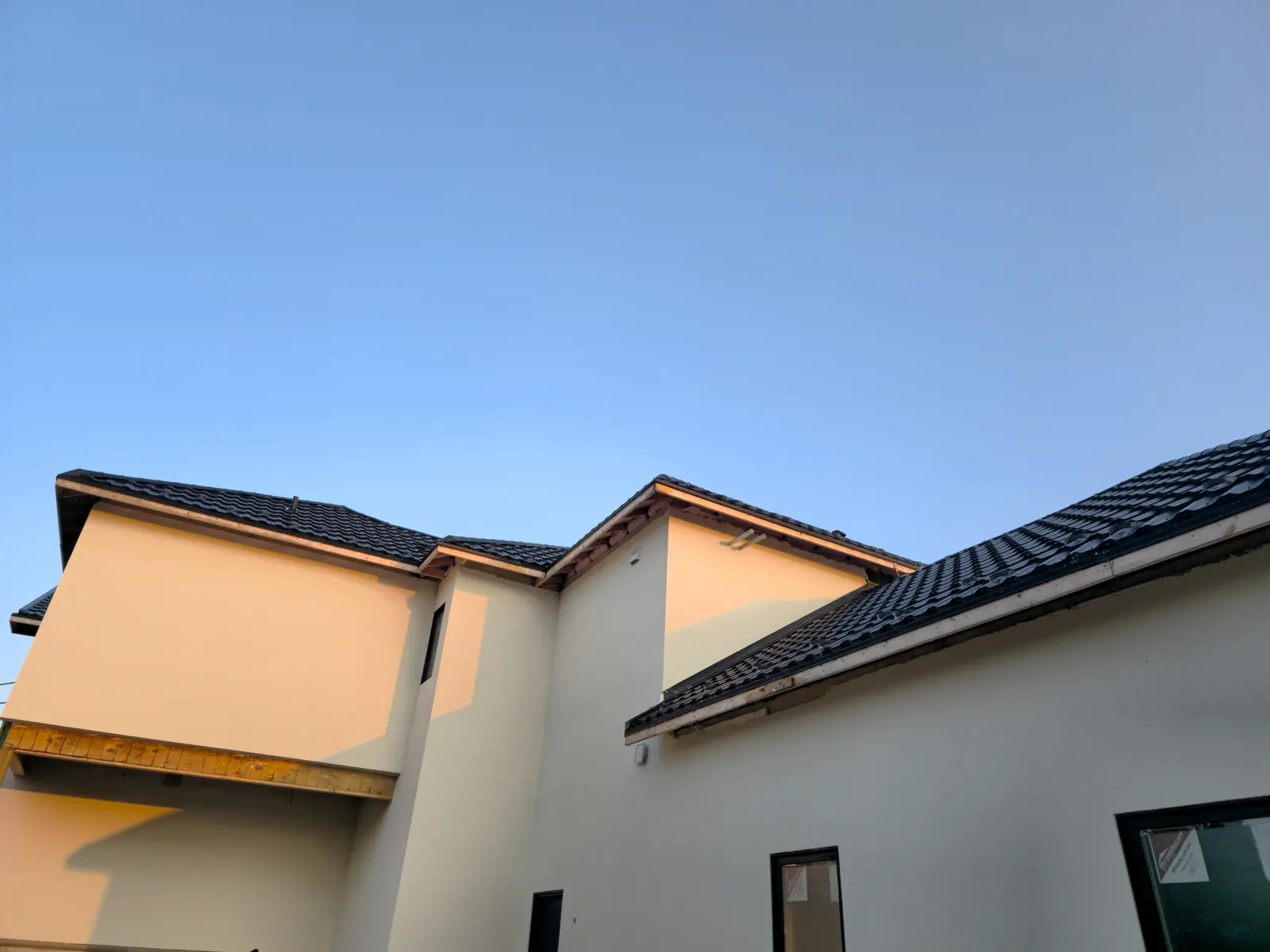 Stucco repair and colour matching on a residential exterior in Niagara